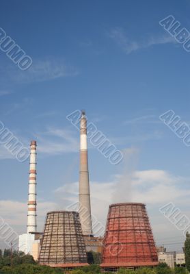 Refinery industrial pipes against blue sky