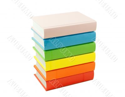 Stack of the colorful books isolated on white