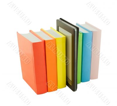 Stack of colorful books with e-book reader