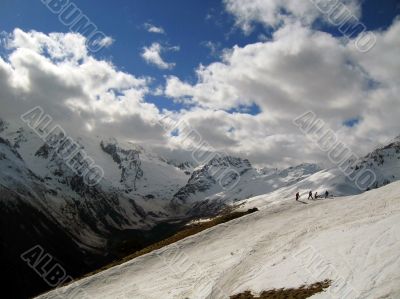 Mountain under the blue sky and the clouds