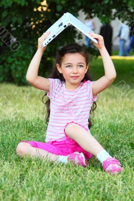 The little girl with the laptop