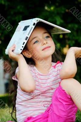 The little girl with the laptop