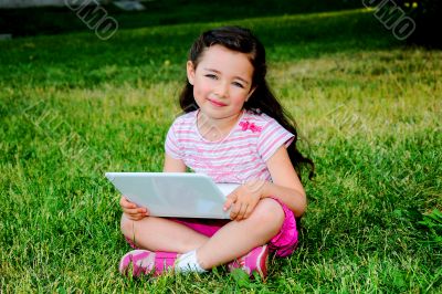 The little girl with the laptop