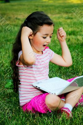 The little girl with the laptop