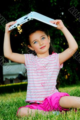 The little girl with the laptop