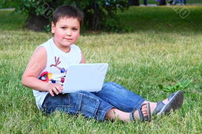 The little boy with the laptop