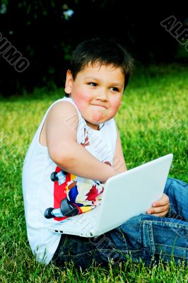 The little boy with the laptop