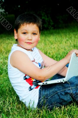 The little boy with the laptop