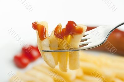 Fried potato on a fork