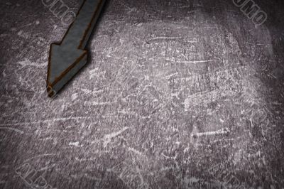 rusty arrow on grunge background