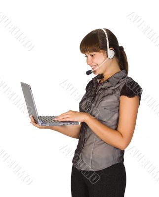 beautiful girl in headset with lapto