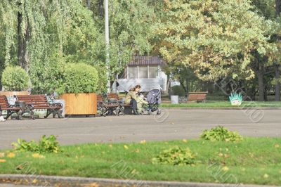 people in a holiday park in autumn