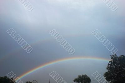 Rainbow rising after rain