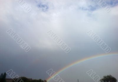 Rainbow rising after rain