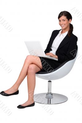 Confident businesswoman with notebook