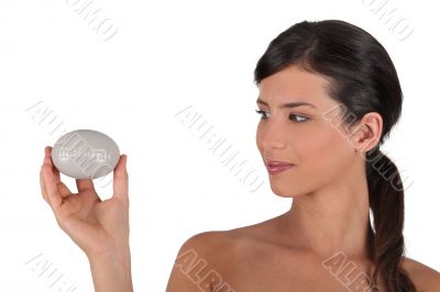 Woman holding a bar of soap
