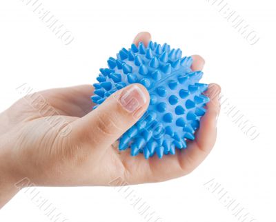 Woman`s hand with massage ball