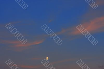Background of colourful sky with moon.