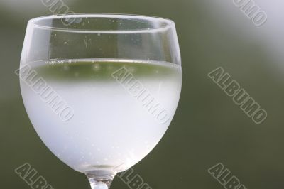 Glass with drink.