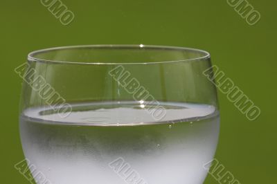Glass with drink.