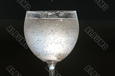 Glass with drink.
