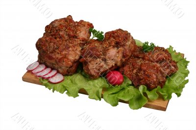 Smoked chicken kebab on wooden board.