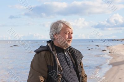 Middle-aged man at the sea.