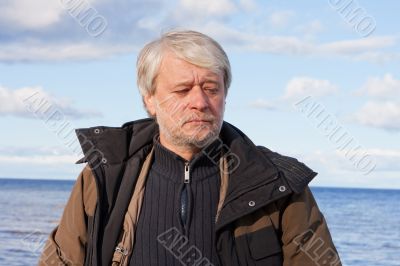 Middle-aged man at the sea.