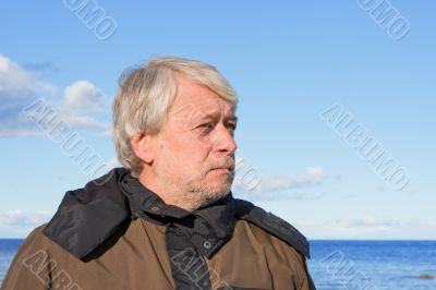 Portrait of middle-aged man at the sea.