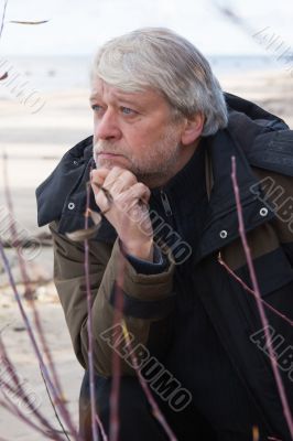 Middle-aged man at the sea.