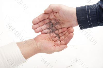 Two hands and needles