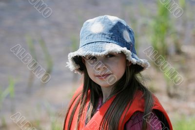 Young girl in summer day.