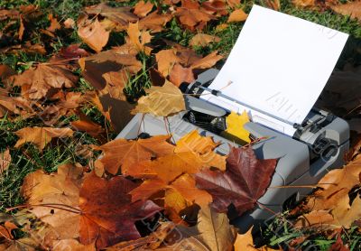 Old Typewriter and Fallen Maple Leaves