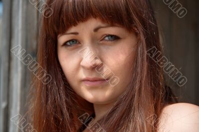 Portrait of beauty red-haired girl.