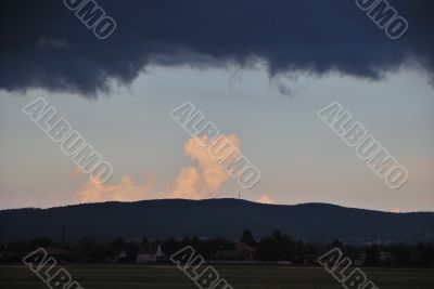black cloud and sun