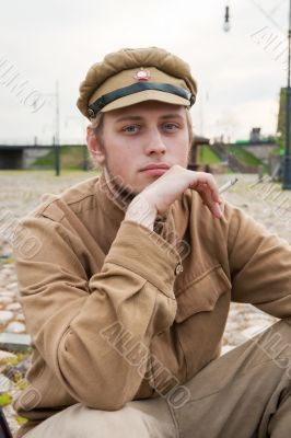 Retro style picture with resting soldier.