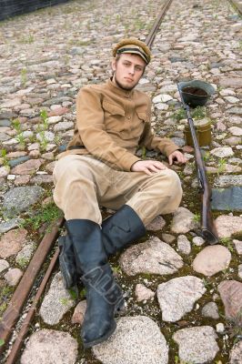 Retro style picture with resting soldier.