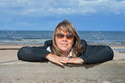 Woman relaxing at the sea.