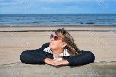 Woman relaxing at the sea.