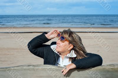Woman relaxing at the sea.