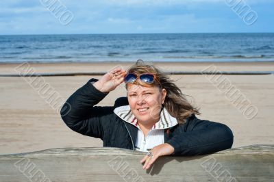 Woman relaxing at the sea.