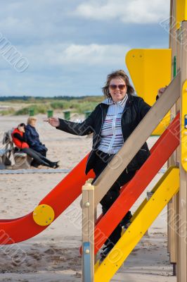 Woman relaxing in dune