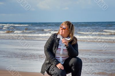 Woman relaxing at the sea.
