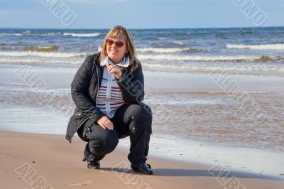Woman relaxing at the sea.