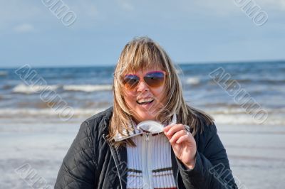Woman relaxing at the sea.