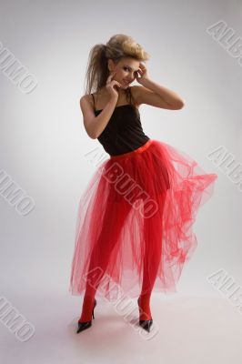 Beautiful girl in red skirt