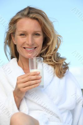 Woman with a glass of milk