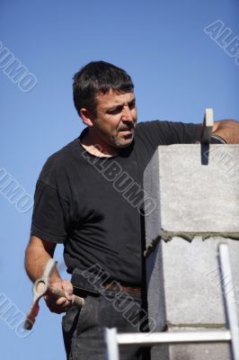 bricklayer at work outdoors