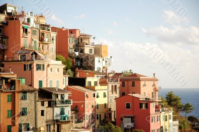 pink,orange,yellow houses