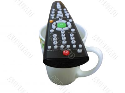Remote control and white tea cap with painting